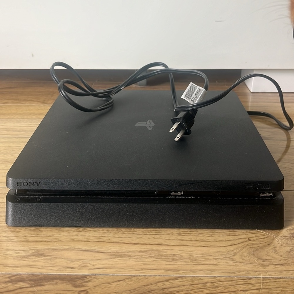 Playstation 4 and 2 Free Controllers - Mint Condition!